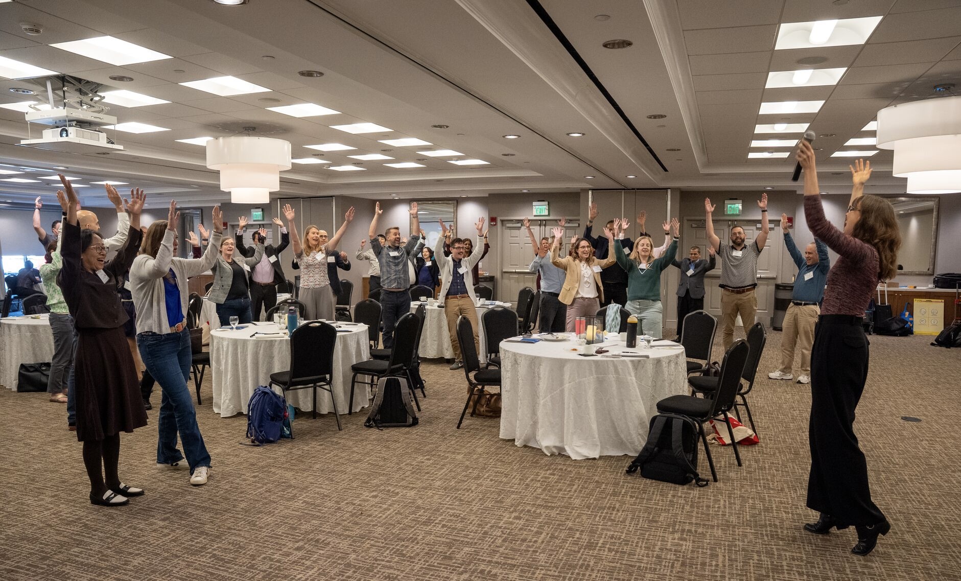 Participants doing ta da exercise