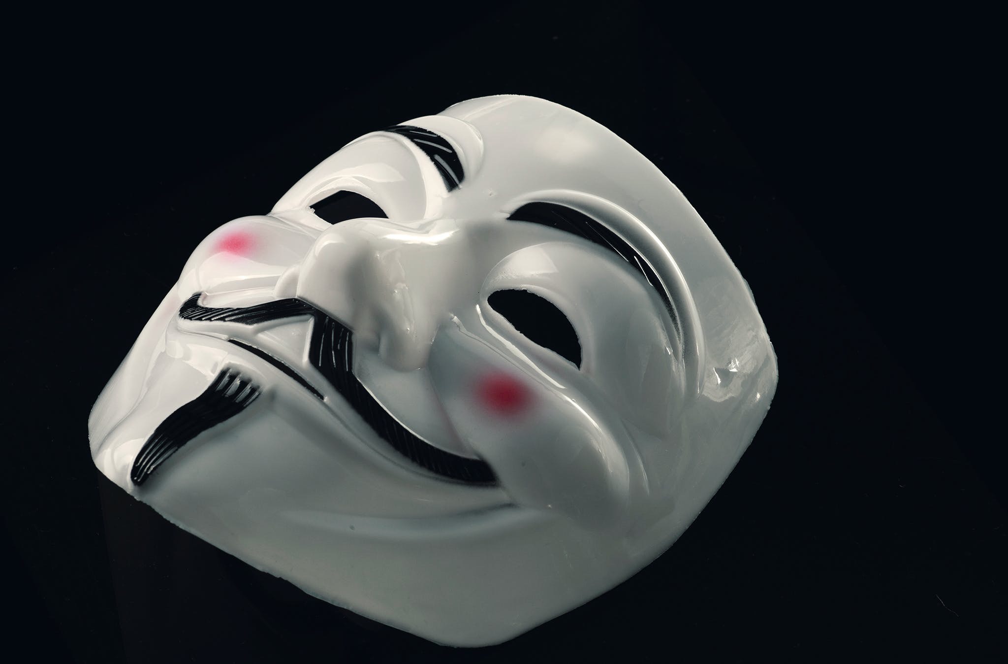 anonymous mask on black background