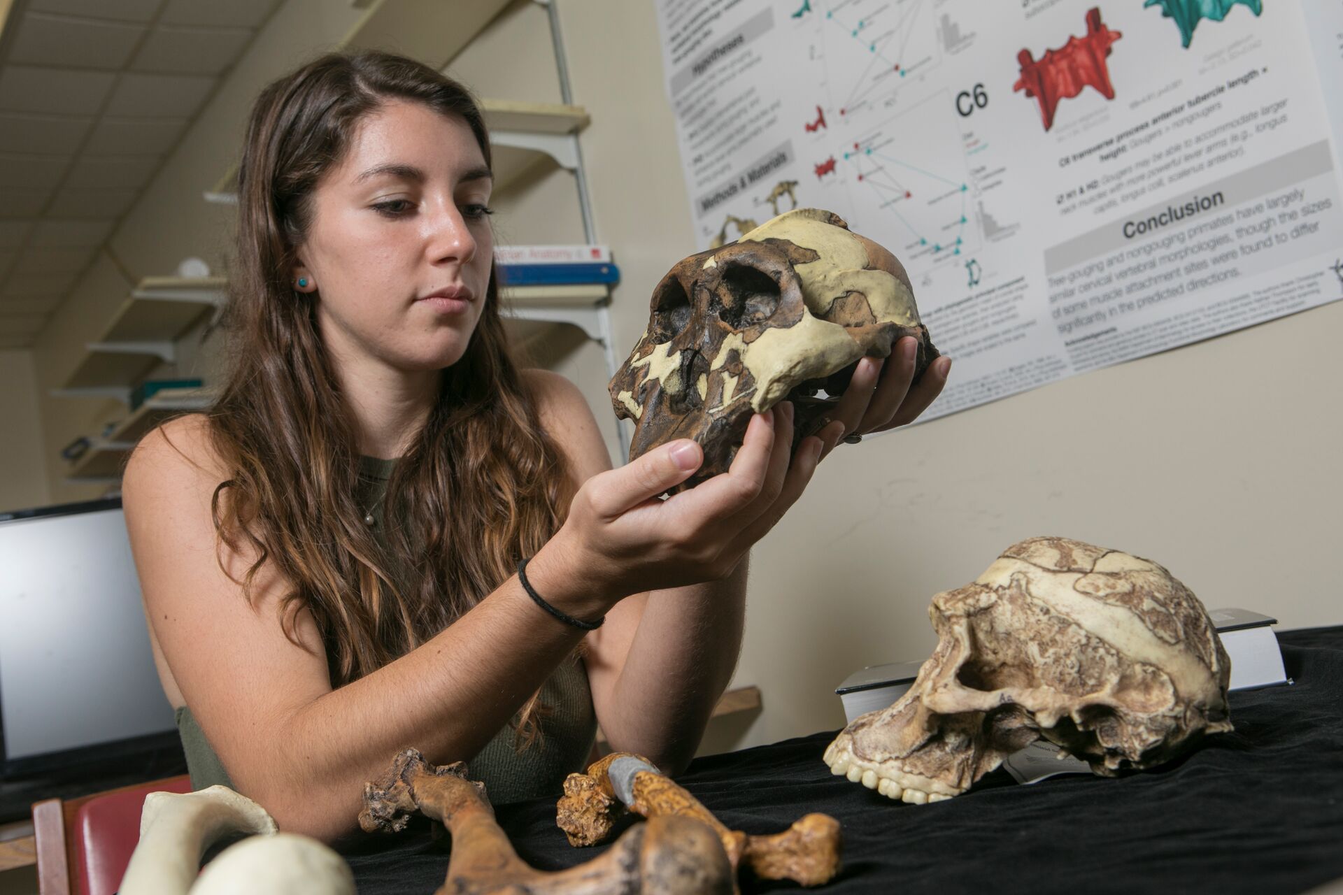 Student holding a Skull