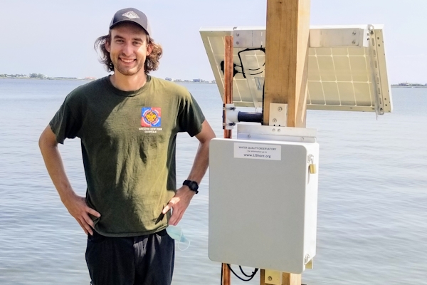 Miles Litzmann at the LIShore salinity observatory at Crescent Avenue, Mecox Bay.